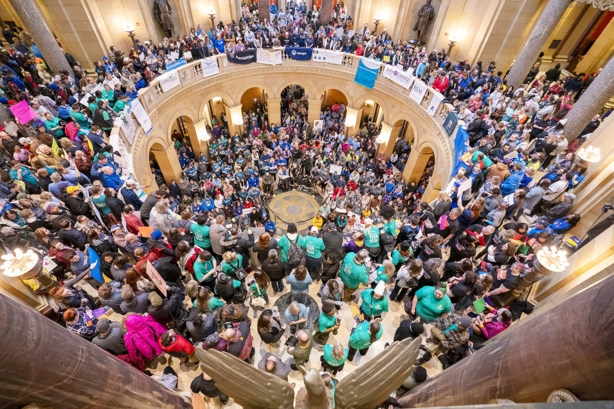 Throngs of people crowd the Capitol Rotunda March 19 for a rally during Disability Services Day at the Capitol. (Photo by Michele Jokinen)